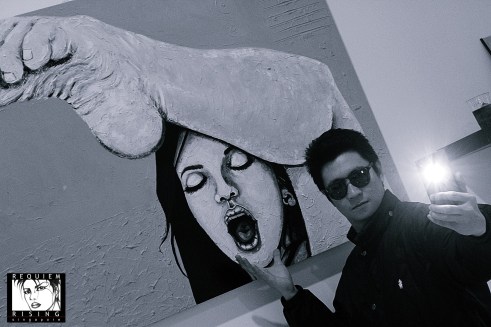 Doing a selfie with Michael Cu Fua's art on the background.
